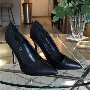 Aldo Black Pumps with Asymmetric toe size 6.5